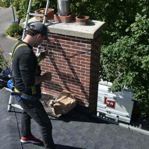 Installing a chimney liner in a wood burning fireplace